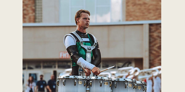 Miami University's Sam Eifert with the Cavaliers Drum and Bugle Corps