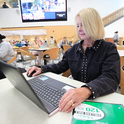 Debbie Brown usually makes a stop at the Armstrong Student Center before classes (photo by Jeff Sabo).