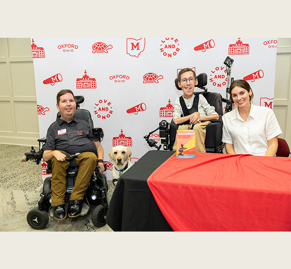 Dan Darkow and Kismet with the influencer Shane Burcaw, who along with his wife, Hannah Burcaw, are known to their 634,000 social media followers as “Squirmy and Grubs.” 